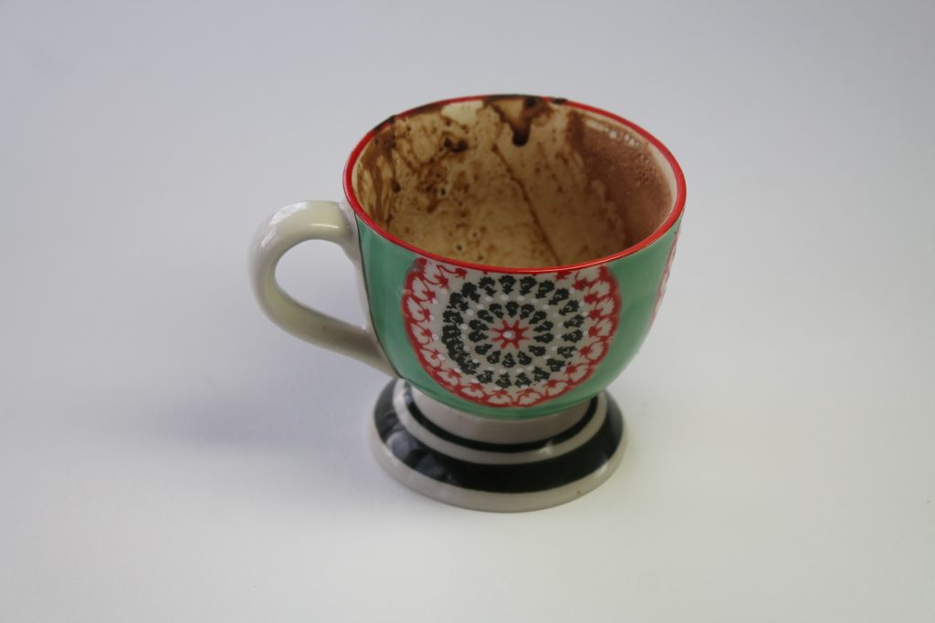 Demitasse cup with chocolate traces